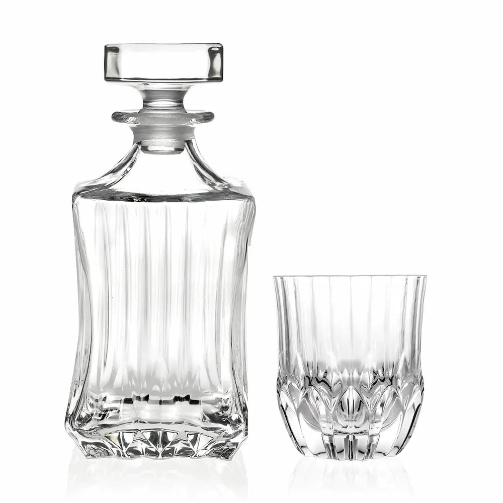 Комплект за уиски RCR Italy Adagio от 7 части, включващ 1 Декантер за уиски + 6 бр. чаши за уиски, елегантен модел с гравирани дълбоки линии в основата за повече блясък. 